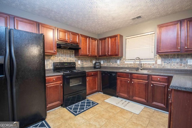 kitchen featuring black appliances, backsplash, sink, and a textured ceiling