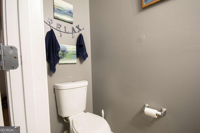 bathroom featuring toilet