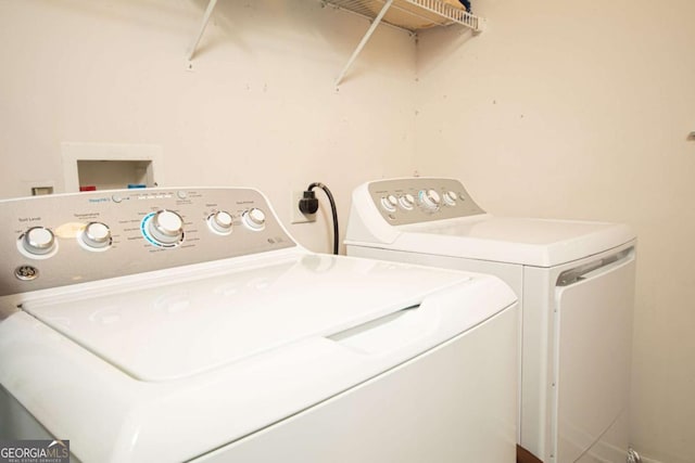 laundry area with washer and dryer