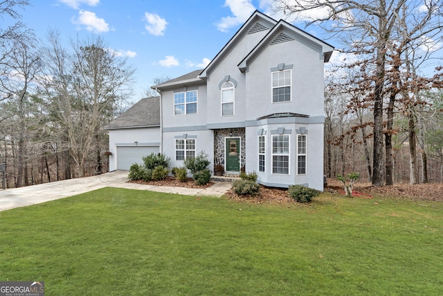 view of front property featuring a front lawn and a garage