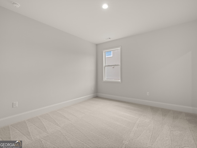 empty room with carpet floors