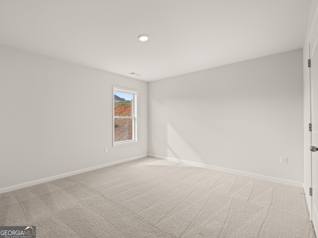 unfurnished room with carpet