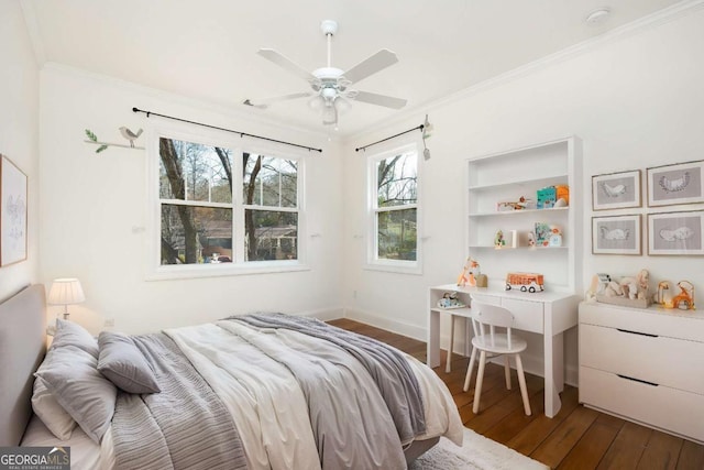 bedroom featuring ceiling fan, dark hardwood / wood-style flooring, and ornamental molding