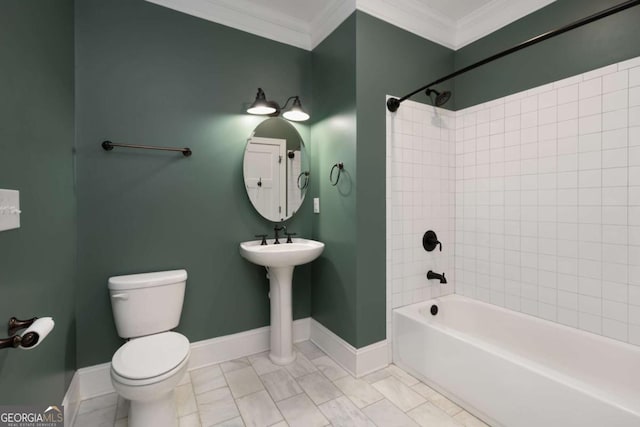 bathroom with toilet, shower / bath combination, and crown molding