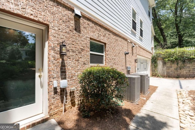 view of property exterior featuring central AC