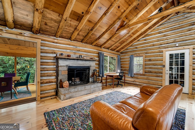 living room with log walls, wood ceiling, a stone fireplace, high vaulted ceiling, and beam ceiling