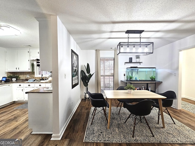 dining area with dark hardwood / wood-style floors