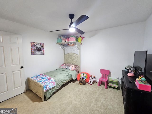 bedroom with ceiling fan and light colored carpet