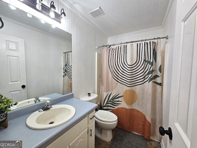 bathroom with a shower with curtain, ornamental molding, a textured ceiling, toilet, and vanity