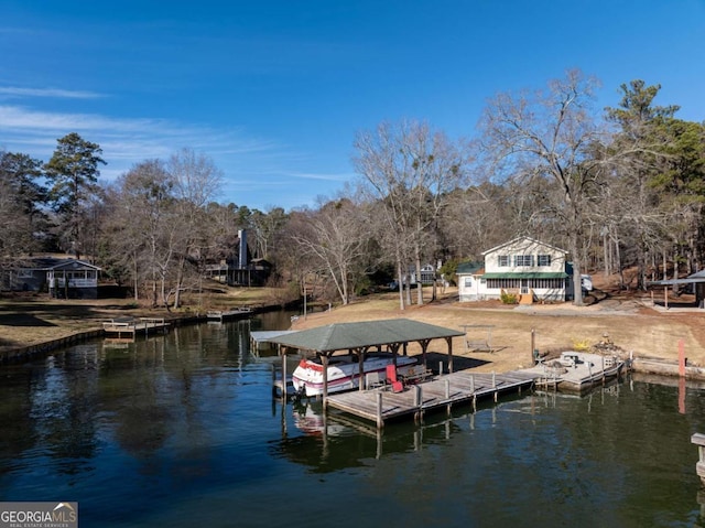 dock area featuring a water view