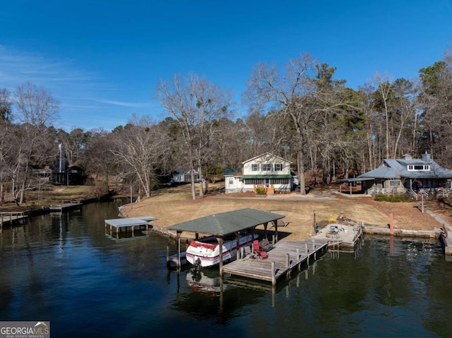 dock area with a water view