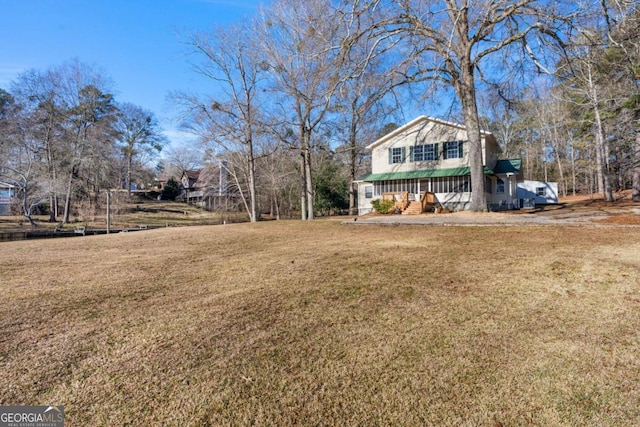 view of yard featuring a porch