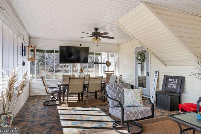 exterior space featuring ceiling fan