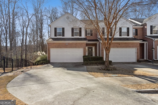 front facade with a garage