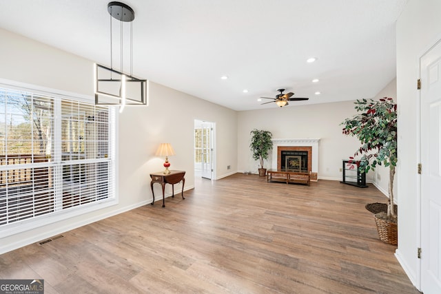 interior space featuring ceiling fan and hardwood / wood-style floors