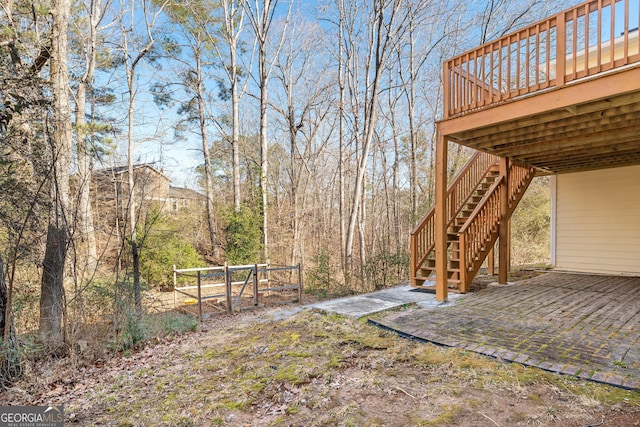 view of yard with a wooden deck