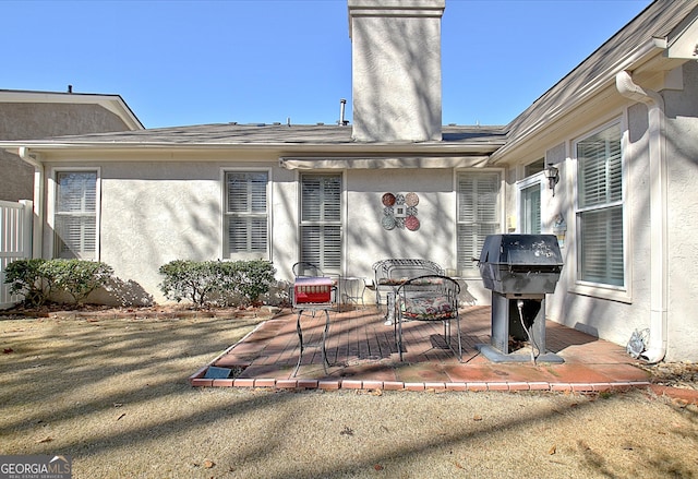 exterior space with area for grilling and a deck