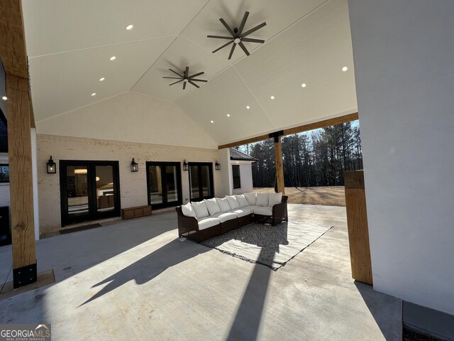 view of patio featuring french doors, ceiling fan, and outdoor lounge area