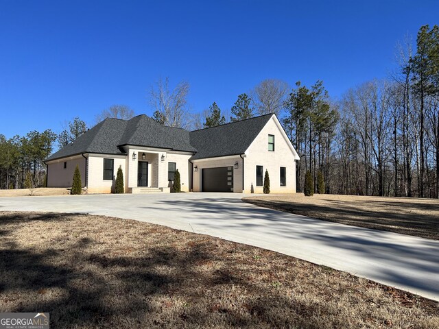 view of front of house with a garage