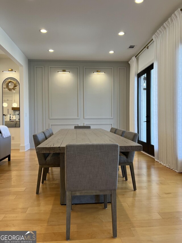 dining space featuring light hardwood / wood-style floors