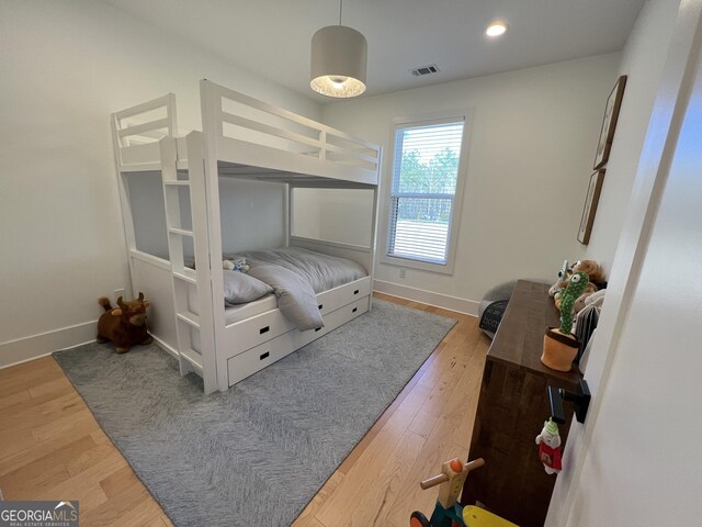 bedroom featuring hardwood / wood-style flooring