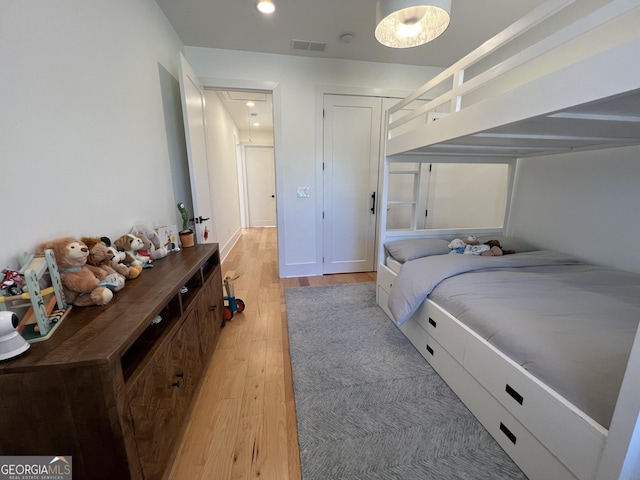 bedroom featuring light hardwood / wood-style flooring