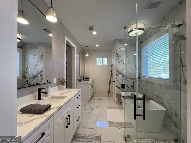 bathroom with vanity and an enclosed shower