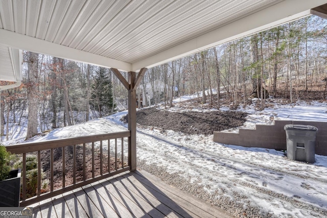 view of snow covered deck