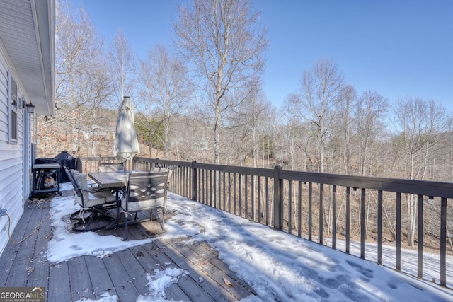 view of snow covered deck