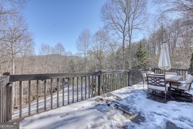 view of snow covered deck