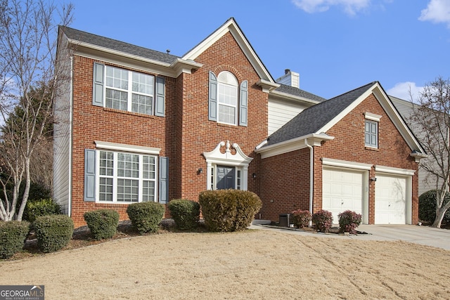 front of property with a garage