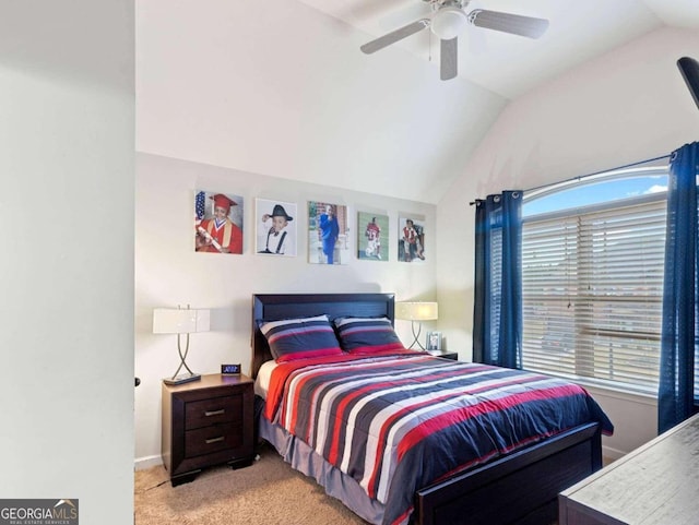 bedroom with ceiling fan, light colored carpet, and lofted ceiling