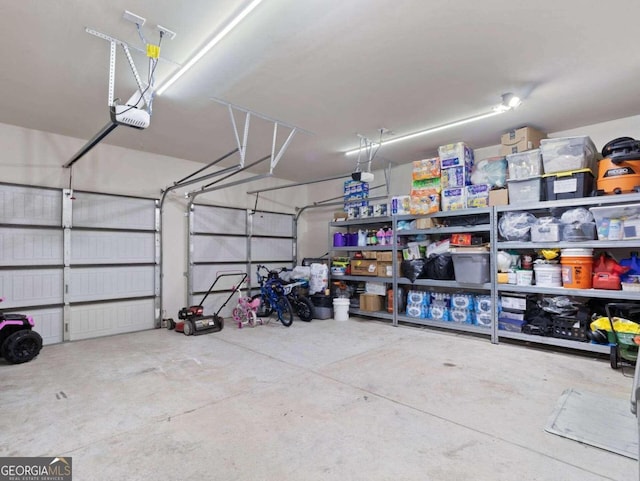 garage featuring a garage door opener