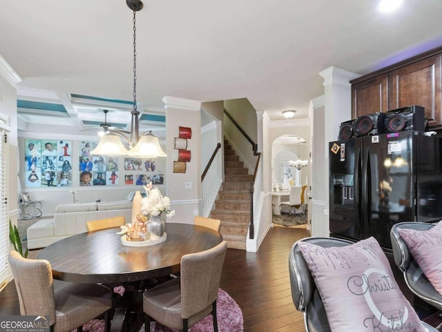 dining space featuring ceiling fan, dark hardwood / wood-style floors, beam ceiling, crown molding, and coffered ceiling