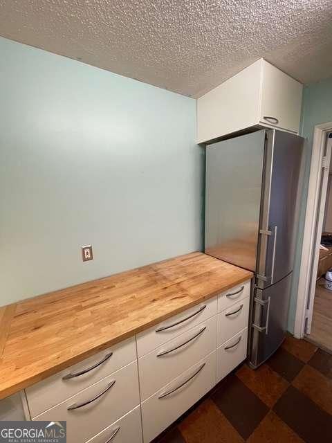 bathroom with a textured ceiling