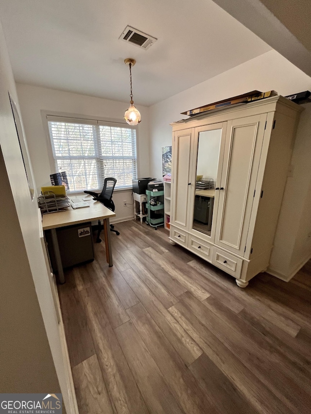 office with wood-type flooring