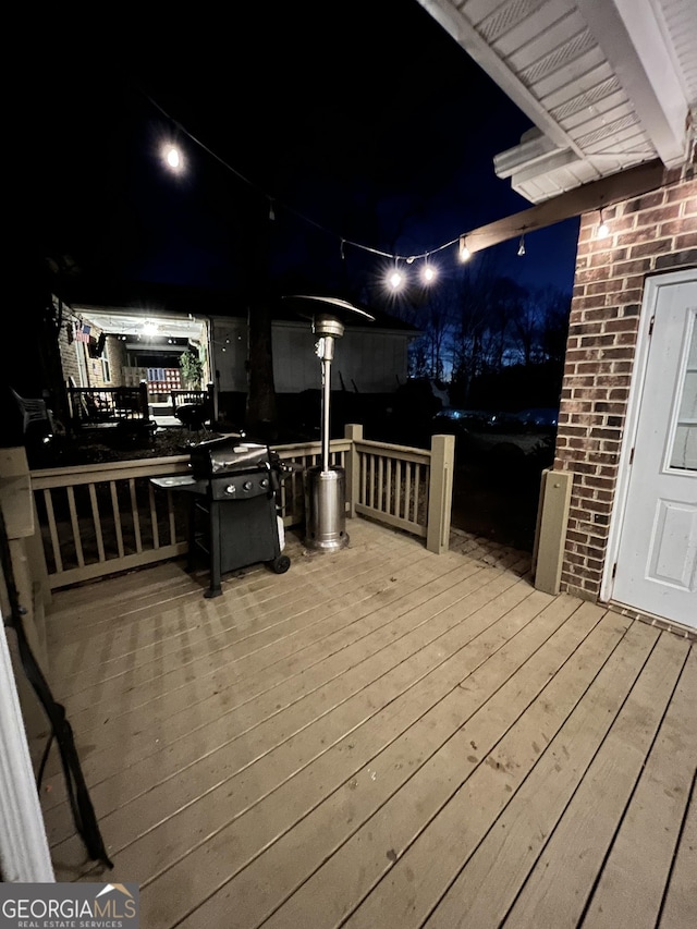 view of deck at twilight