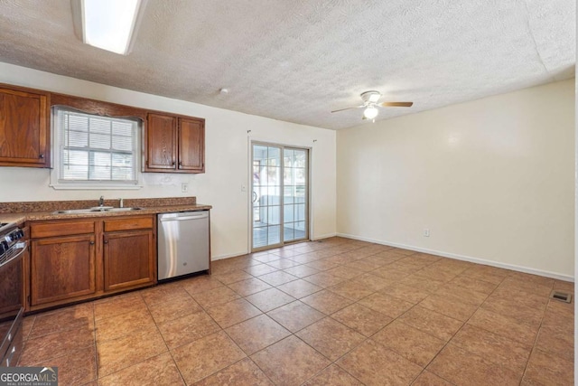 kitchen with ceiling fan, dishwasher, sink, and plenty of natural light