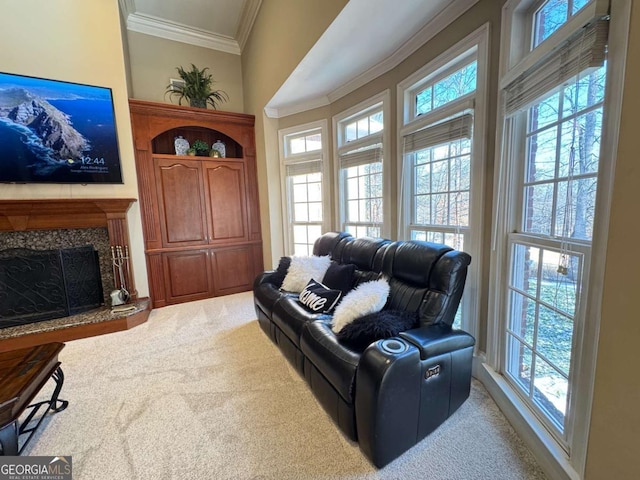 living room with light colored carpet, a premium fireplace, and crown molding