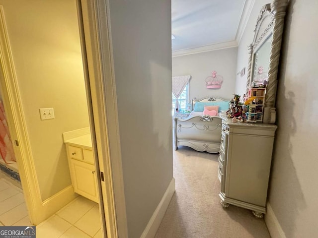 hall featuring light carpet and crown molding