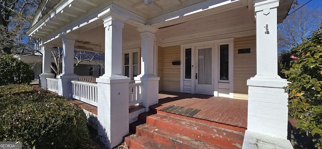 doorway to property with covered porch