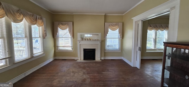 living room with a brick fireplace and crown molding