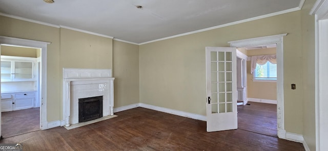 unfurnished living room featuring dark hardwood / wood-style floors and crown molding