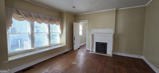 unfurnished living room featuring dark hardwood / wood-style flooring and crown molding