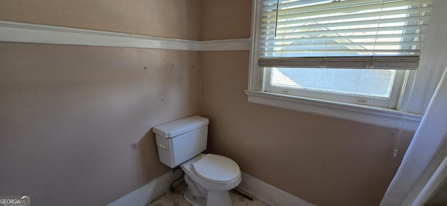 bathroom featuring toilet