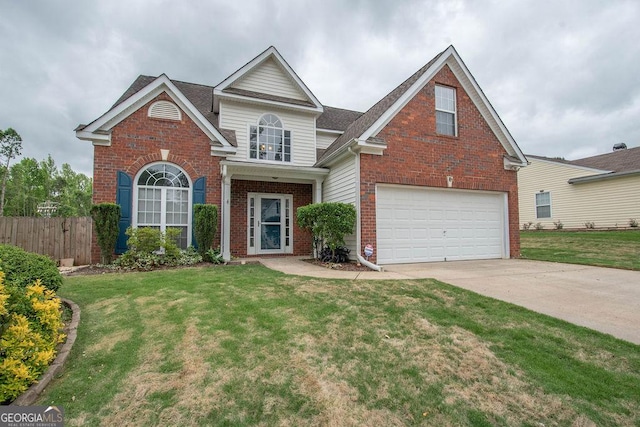 view of front property featuring a front yard and a garage