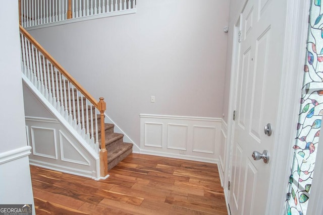 foyer entrance featuring hardwood / wood-style floors