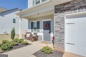 view of exterior entry with a garage