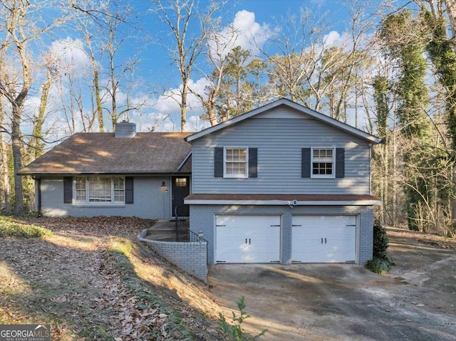 tri-level home featuring a garage