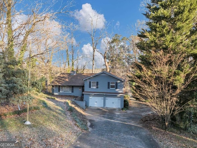 view of front of home with a garage